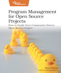 Book cover for Program Management for Open Source Projects, showing a row of rubber ducks on a white background. A few of the ducks are slightly out of line.